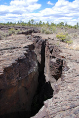 Cracked lava flow in Mal Pais wilderness New Mexico.