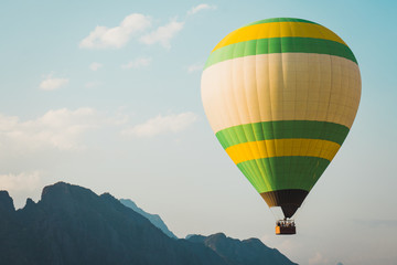 People on boats and air balloon