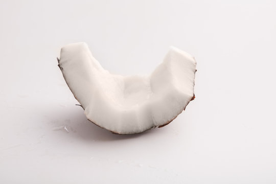 Coconut piece on white background