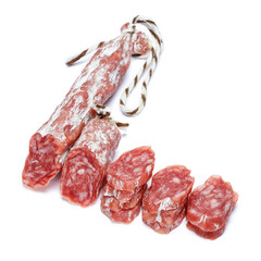 Dried organic salami sausage on white background