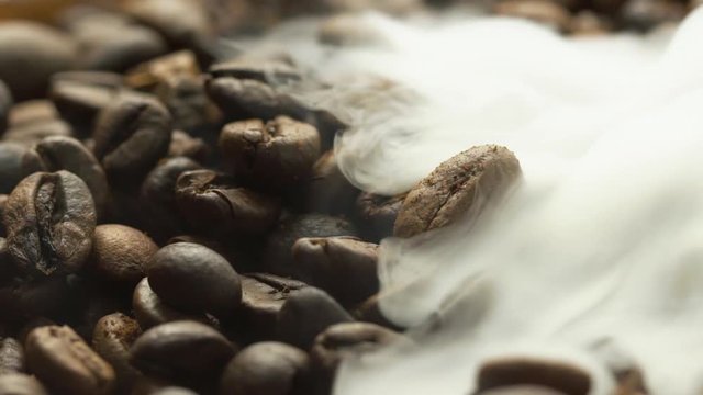 Fried coffee beans, delicious aroma, covered with smoke, roasted grain cafe flavor taste hot fresh smell morning 