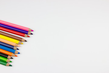 Pencils on white background. Free space for designers