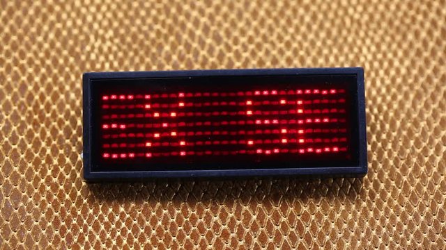 sliding text SEX flashing made with red LEDs