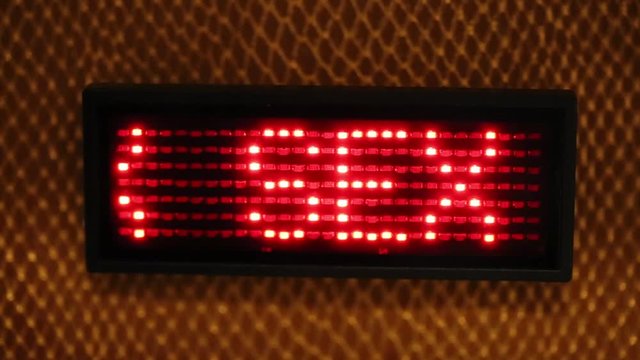 sliding text SEX flashing made with red LEDs