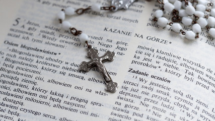 Rosary and polish Bible - Sermon on the Mount. Close up.