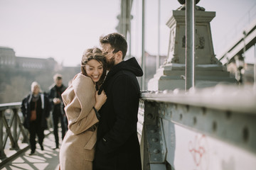 Loving couple on Chain bridge, Budapest © BGStock72