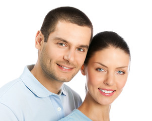 Portrait of young happy smiling attractive couple, isolated on white background