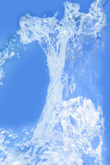 Naklejka na ściany i meble Abstract clear blue water splash with bubbles. Close up.