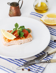 grilled salmon with cherry tomatoes and salad