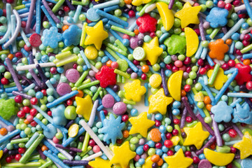 Fototapeta na wymiar Colorful sugar background. Bright candies pattern.