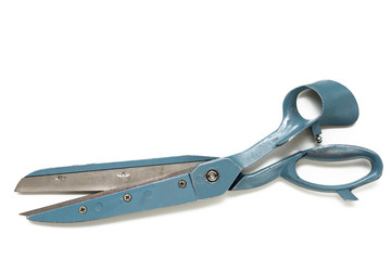 Retro blue tailor scissors at white background