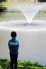 Boy Watching Fountain