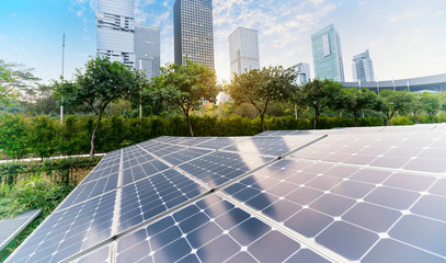 solar panel plant with urban landscape landmarks,Ecological energy renewable concept.
