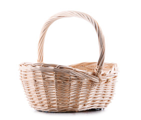 Empty wicker basket isolated on white