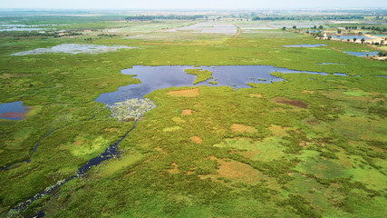 Aerial view of lake in Siem-Reap, Cambodia, with fisherman boat