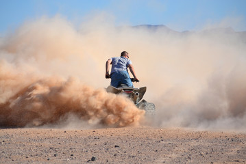 Four Wheeler Dust Cloud
