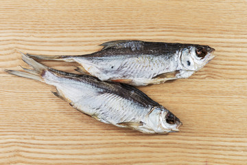 dry roach on wooden background