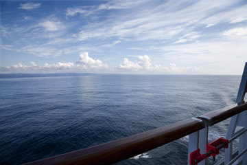Seascape with clouds view from the railing deck ship cruise
