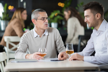 Businessmen in a restaurant