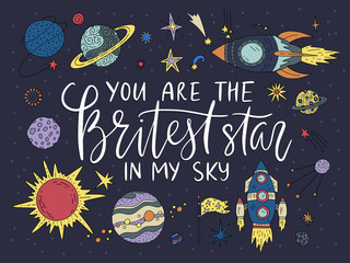 Handdrawn lettering quote with galaxy illustrations.