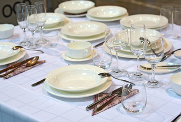 A shot of table settings in fine restaurant. Selective focus.