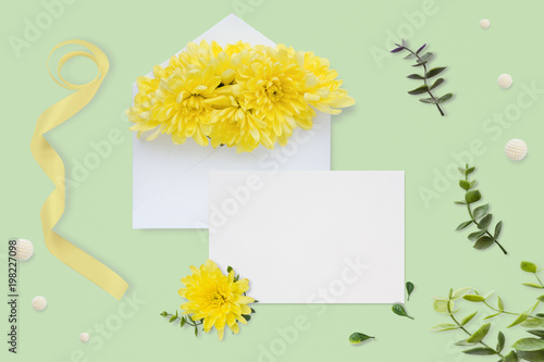 Letter Envelope And A Present On Pastel Green Background Wedding