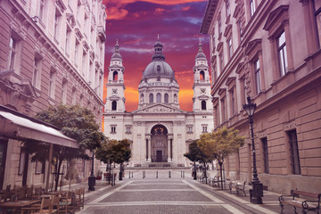 St. Stephen's Basilica over cloudy sunset, Budapest, Hungary. View of Szent Istvan Bazilika from Zrinyi Utca.