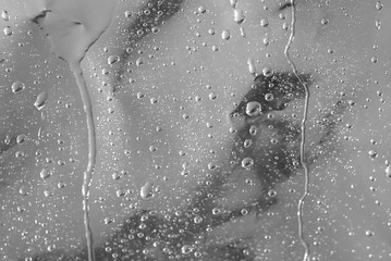 drops of water on a dark surface