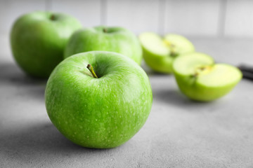 Fresh green apples on table, closeup