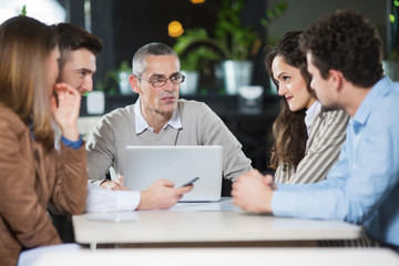 Business meeting in cafe