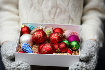 Glass Christmas decoration in hands