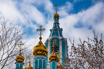 Domes of an Orthodox church and blue sky
