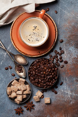 Obraz na płótnie Canvas Coffee cup, beans and sugar
