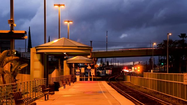 Metro train station at dusk - time lapse