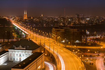 Panorama of Warsaw at night with Vistula river, Poland