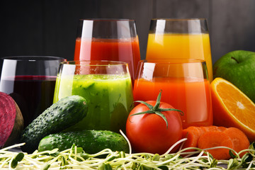 Glasses with fresh organic vegetable and fruit juices