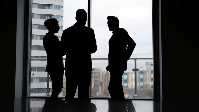 Business team of managers standing talk in office