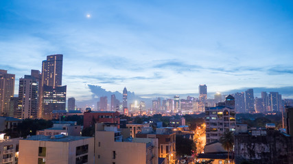 Panorama of the City of Manila with skyscrapers early in the morning.