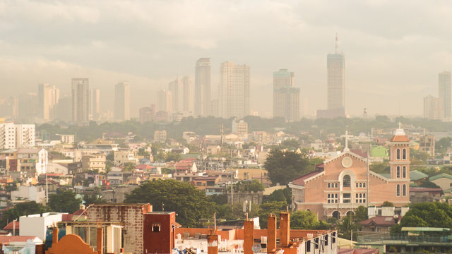 Panorama of the City of Manila with skyscrapers early in the morning.