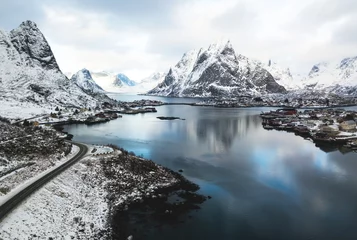 Papier Peint photo autocollant Reinefjorden Beautiful winter snowy wide-angle summer aerial view of Reine, Norway, Lofoten Islands, with skyline, mountains, famous fishing village with red fishing cabins, Moskenesoya, Nordland, shot from drone
