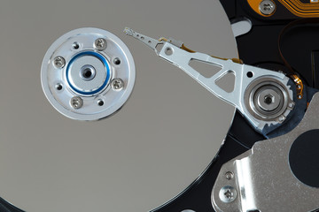 Computer hard disk - interior with visible plate and laser