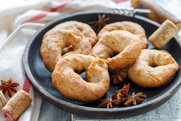 Traditional Italian wine donuts on a wooden platter.