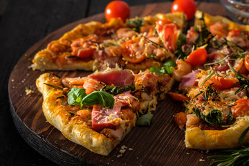 Delicious homemade fresh pizza with shrimps and bacon