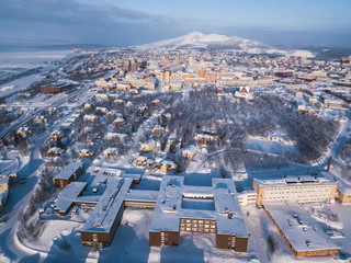 Aerial winter view of Kiruna, the northernmost town in Sweden, province of Lapland, winter sunny picture shot from drone