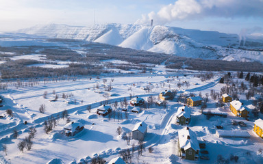 Aerial winter view of Kiruna, the northernmost town in Sweden, province of Lapland, winter sunny picture shot from drone