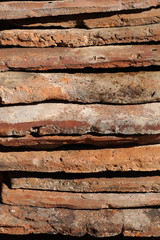 A pile of old roof bricks