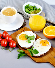 Morning Coffee White Cup Beverage Orange Juice Sandwich with Tasty Fried Egg Served on a Wooden Tray Parsley Pepper Tomato Cherry Grey Background Healthy Food Concept Vegetarian Modern Lifestyle 