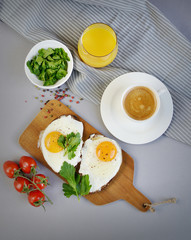Morning Coffee White Cup Beverage Orange Juice Sandwich with Tasty Fried Egg Served on a Wooden Tray Parsley Pepper Tomato Cherry Grey Background Healthy Food Concept Vegetarian Modern Lifestyle 