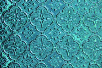 Blue, denim and tiffany background glass. Old vintage glass with an abstract floral and geometric...