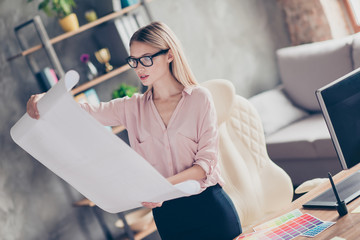 Pretty, attractive, charming, successful, thoughtful animator holding open, drawing sheet, whatman...